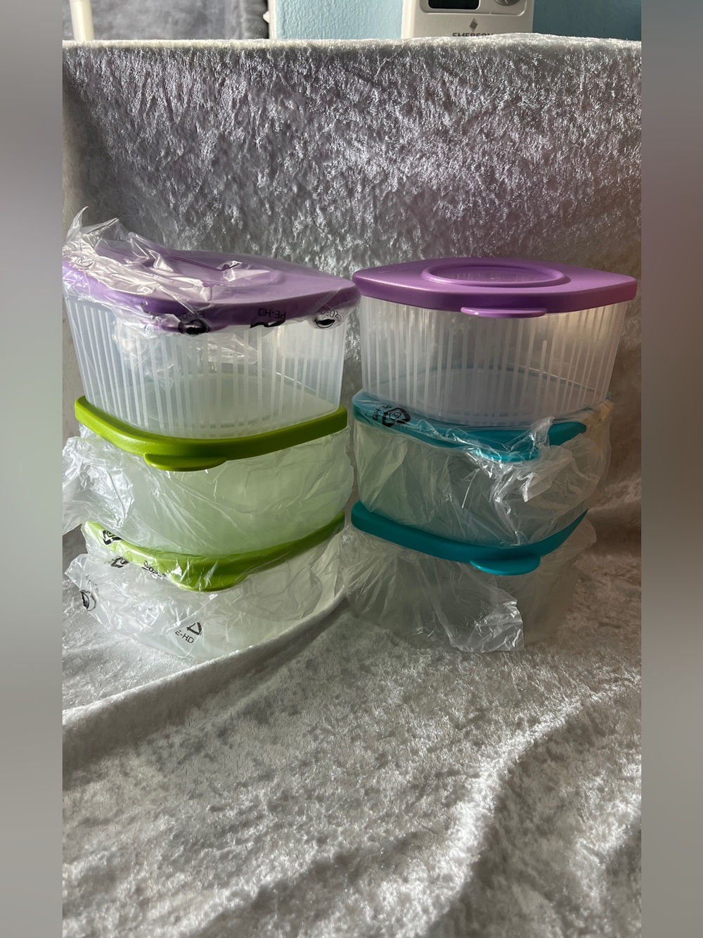 Tupperware Clear Containers with Purple, Green, and Teal Lids